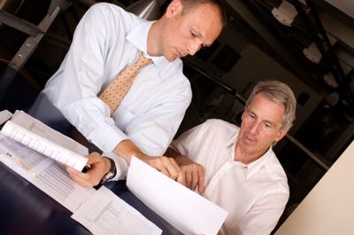 two businessmen discussing at the meeting